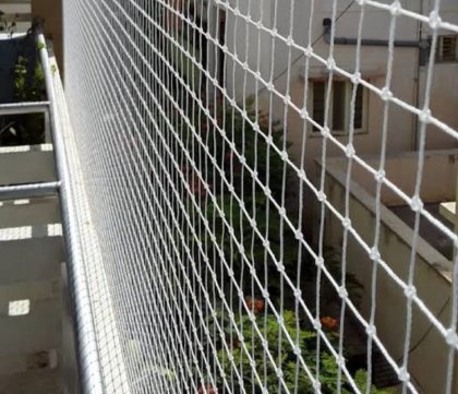 Pigeon net installation for a Gurugram apartment window